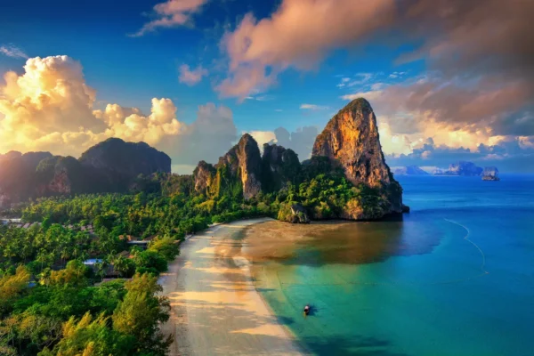 Limestone karst cliffs rising from turquoise water near Krabi